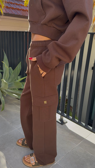 Side angle of Espresso studio plush cargo pants highlighting pockets, plush fabric and clean straight leg